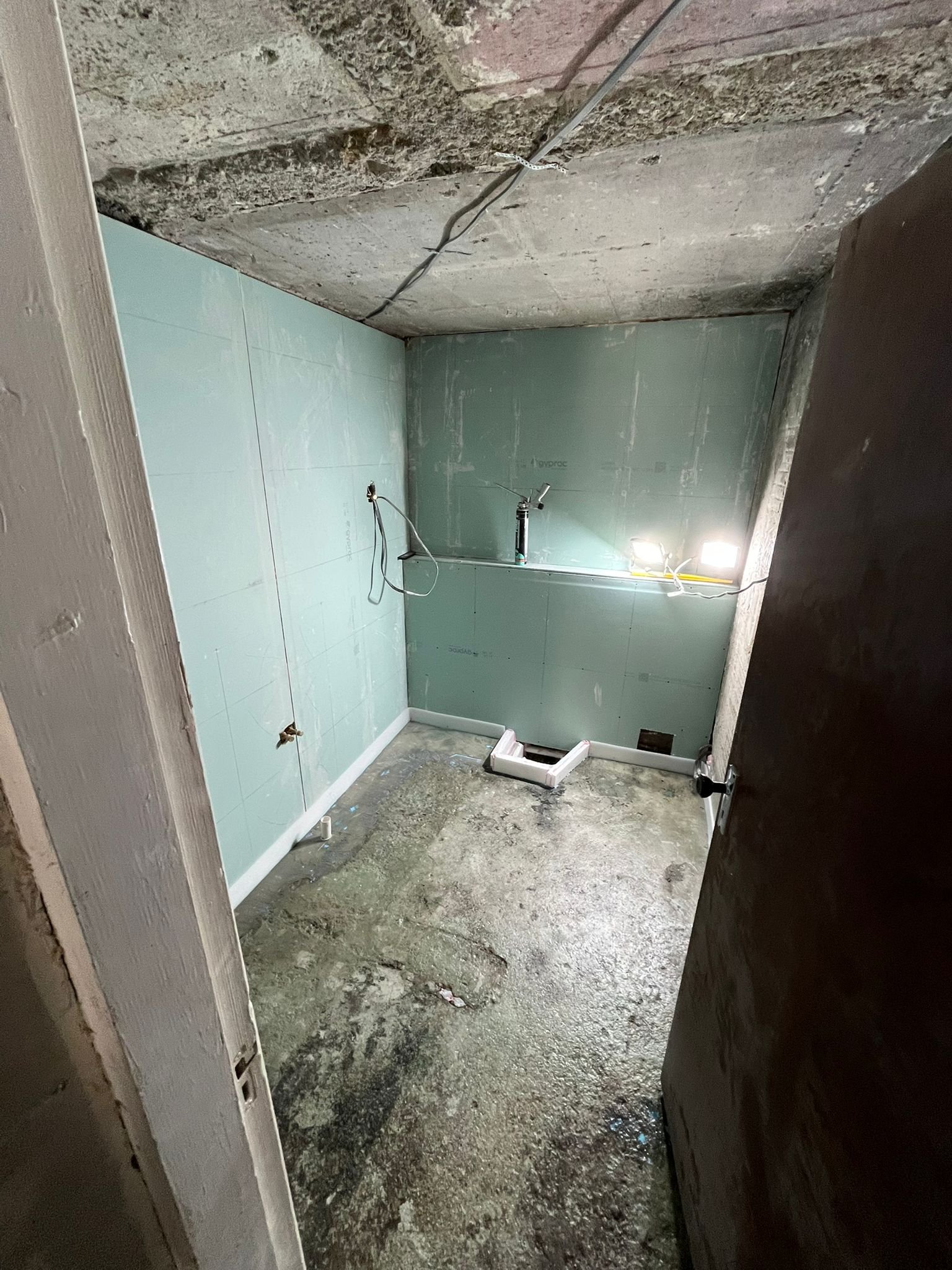 Bathroom wall and fixture work