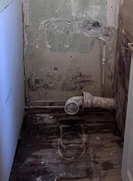 Toilet waste pipework before the connection layout was corrected