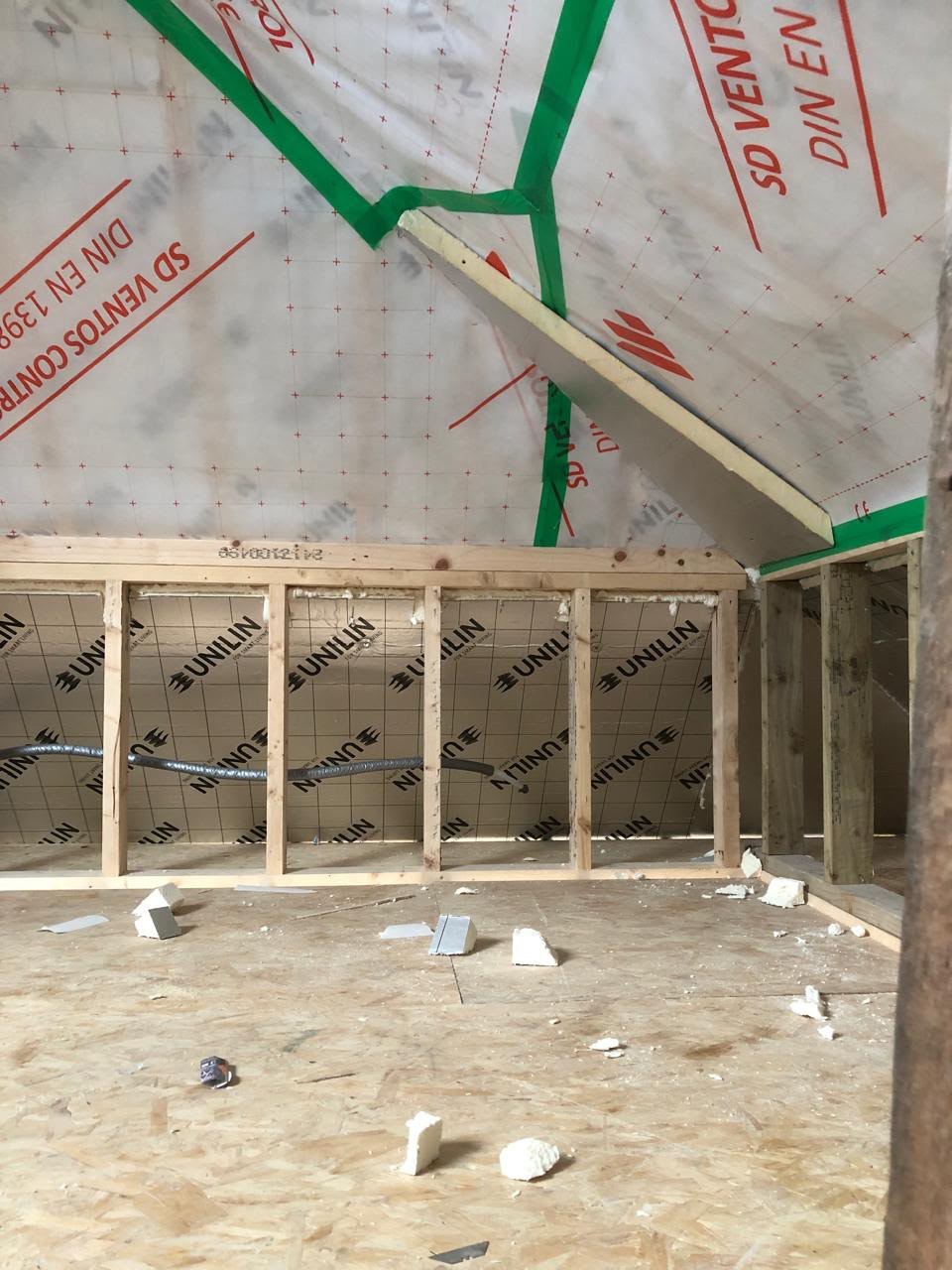 Insulation material application in progress